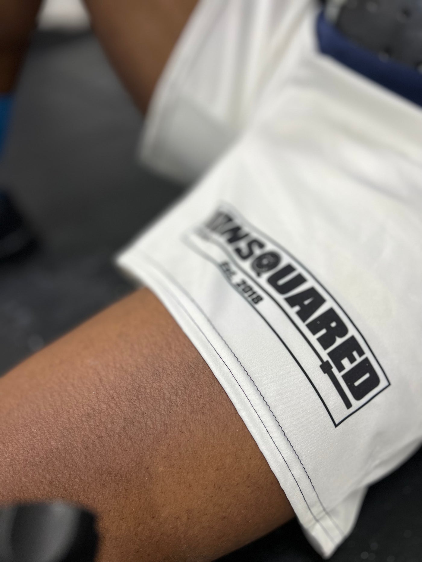 Sweaty Whites WOD Shorts — IronSquared shorts, back view